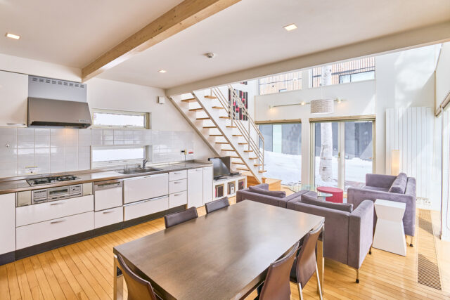 20240305 Niseko Central Hirafu House1 HH01 Living Room Kitchen Winter Lores DSC7233 1