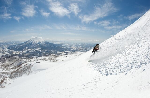 Powder snowboarding with the best view over Mt Yotei